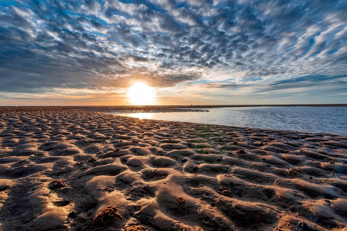 Sunset over tidal flats and beach near Parksville on Vancouver Island